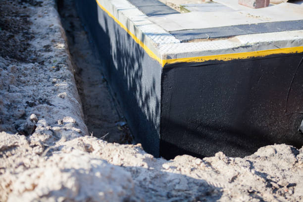 Professional Waterproofing technician working in Clinton, OH